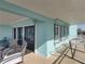 Spacious balcony equipped with seating, perfect for enjoying ocean views and outdoor living at 19440 Gulf Blvd # 301, Indian Rocks Beach, FL 33785