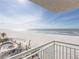 Relax on the balcony with scenic ocean and pool views, offering a perfect blend of tranquility and recreation at 19440 Gulf Blvd # 301, Indian Rocks Beach, FL 33785