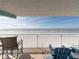 Relaxing balcony seating with stunning ocean views and white sand at 19440 Gulf Blvd # 301, Indian Rocks Beach, FL 33785