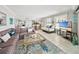 Inviting living room showcases an open layout, comfortable seating, and access to the kitchen at 19440 Gulf Blvd # 301, Indian Rocks Beach, FL 33785