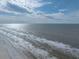 Expansive ocean view from a high vantage point, showcasing the waves and coastline at 19440 Gulf Blvd # 301, Indian Rocks Beach, FL 33785