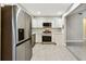 Updated kitchen boasting stainless steel appliances, sleek countertops, and ample cabinet space for storage at 2 S Treasure Dr, Tampa, FL 33609