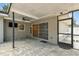 Covered and enclosed lanai with pavers and convenient access to indoor living areas at 2 S Treasure Dr, Tampa, FL 33609