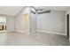 Bright living room with modern gray flooring and neutral walls offers a clean, contemporary aesthetic at 2 S Treasure Dr, Tampa, FL 33609