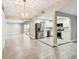 Open-concept layout that showcases modern stainless steel appliances and sleek cabinetry in the adjacent kitchen at 2 S Treasure Dr, Tampa, FL 33609