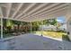 Spacious covered patio area with concrete flooring, perfect for outdoor entertaining or relaxation at 2509 W Crawford St, Tampa, FL 33614