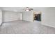 Large living room offers tile floors and an open concept layout at 2509 W Crawford St, Tampa, FL 33614