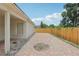 Spacious brick-paved patio in backyard with a built-in fire pit perfect for outdoor gatherings at 2625 Brookville Dr, Valrico, FL 33596
