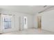Bright bedroom featuring natural light and doors to the hallway, bathroom, and closet providing a welcoming atmosphere at 2625 Brookville Dr, Valrico, FL 33596