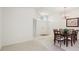 View of the dining room showing the front entry and chandelier at 2625 Brookville Dr, Valrico, FL 33596