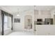 Bright and airy living room featuring ample natural light and an open layout with a view of the kitchen at 2625 Brookville Dr, Valrico, FL 33596