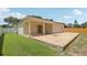 Brick paved patio extends to the house with a covered porch for outdoor living and entertainment at 2625 Brookville Dr, Valrico, FL 33596
