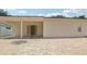 Brick-paved patio extends from a covered area, with sliding glass doors, making it ideal for entertaining at 2625 Brookville Dr, Valrico, FL 33596