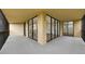 Corner outdoor balcony offering serene views of the surrounding trees and greenery at 3062 Eastland Blvd # 308, Clearwater, FL 33761