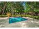 Community hot tub surrounded by lush landscaping offering privacy and relaxation at 3062 Eastland Blvd # 308, Clearwater, FL 33761