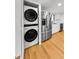 Well-equipped kitchen featuring modern stainless steel appliances and convenient in-unit laundry at 3062 Eastland Blvd # 308, Clearwater, FL 33761