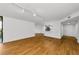 Spacious living area with modern lighting, and views into the kitchen at 3062 Eastland Blvd # 308, Clearwater, FL 33761