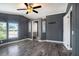 Nice bedroom featuring ceiling fan, neutral colors and windows providing relaxing outdoor views at 3125 Beaver Creek Dr, Wesley Chapel, FL 33543