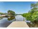 Scenic waterfront view from the private dock, offering tranquility and access to the water at 3225 Rosery Ne Rd, Largo, FL 33771