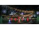 Park illuminated with colorful holiday lights and festive decorations at 3225 Rosery Ne Rd, Largo, FL 33771