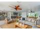 Bright living room with modern furnishings, hardwood floors, and an open concept design, offering ample space at 3225 Rosery Ne Rd, Largo, FL 33771