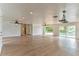Bright open floor plan with hardwood floors and pool views at 3225 Rosery Ne Rd, Largo, FL 33771