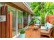 Charming patio with seating area surrounded by lush landscaping at 3225 Rosery Ne Rd, Largo, FL 33771