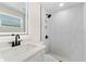 Bathroom features a marble shower and modern fixtures at 4016 Grayton Dr, New Port Richey, FL 34652