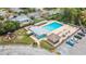 This aerial shot showcases the community pool, offering a refreshing oasis and recreation at 4016 Grayton Dr, New Port Richey, FL 34652