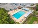 A community pool, complete with a tiki bar and ample lounging space, awaits residents at 4016 Grayton Dr, New Port Richey, FL 34652