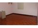 Bedroom with hardwood floors, a window and no furniture at 4105 W Tyson Ave, Tampa, FL 33611