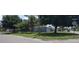 Charming single-story home featuring a well-maintained lawn and mature trees at 4105 W Tyson Ave, Tampa, FL 33611