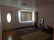 Bright living room featuring parquet floors, a front door and window with blinds at 4105 W Tyson Ave, Tampa, FL 33611