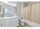 Bright bathroom features tiled floors, a tub and shower, and a white vanity at 4207 S Dale Mabry Hwy # 2101, Tampa, FL 33611