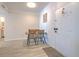 Light dining area features seating for four and white front door at 4207 S Dale Mabry Hwy # 2101, Tampa, FL 33611