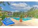 Gorgeous community pool with plenty of lounge chairs, mature trees and resort-style living at 4207 S Dale Mabry Hwy # 2101, Tampa, FL 33611