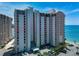 Exterior view of the waterfront condo building at 440 S Gulfview Blvd # 701, Clearwater Beach, FL 33767