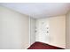 Hallway view showing two doors with fresh paint and clean carpet; a blank canvas ready to be customized at 440 S Gulfview Blvd # 701, Clearwater Beach, FL 33767