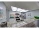 This open kitchen features stainless steel appliances, granite counters and breakfast bar at 440 S Gulfview Blvd # 701, Clearwater Beach, FL 33767