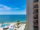 Balcony view of the beach, pool and ocean at 440 S Gulfview Blvd # 701, Clearwater Beach, FL 33767