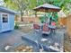 A wooden deck and outdoor dining set create a perfect backyard relaxation spot at 4505 S Clark Ave, Tampa, FL 33611