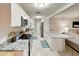 Open kitchen featuring modern appliances and ample counter space, ideal for cooking and entertaining at 4505 S Clark Ave, Tampa, FL 33611
