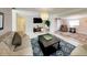 Stylish living room offering a relaxed atmosphere, complete with cozy furnishings and an open layout at 4505 S Clark Ave, Tampa, FL 33611