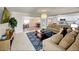 Comfortable living room flows into a dining area and modern kitchen, perfect for entertaining at 4505 S Clark Ave, Tampa, FL 33611