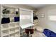 Bright office featuring built in shelves and desk space perfect for working at home at 4505 S Clark Ave, Tampa, FL 33611