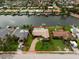 Aerial view of a waterfront property with a defined property line and a beautiful backyard at 4754 Overlook Ne Dr, St Petersburg, FL 33703
