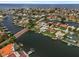 Aerial view of waterfront homes, docks, and boats along winding canals at 4754 Overlook Ne Dr, St Petersburg, FL 33703