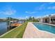 Waterfront home with private dock and in-ground pool with brick paver deck at 4754 Overlook Ne Dr, St Petersburg, FL 33703