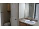Bathroom featuring a single vanity, a linen closet, and a shower with a glass door at 5000 Culbreath Key Way # 1-220, Tampa, FL 33611
