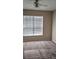 Bright bedroom featuring a window, and a neutral color scheme to create a serene atmosphere at 5000 Culbreath Key Way # 1-220, Tampa, FL 33611